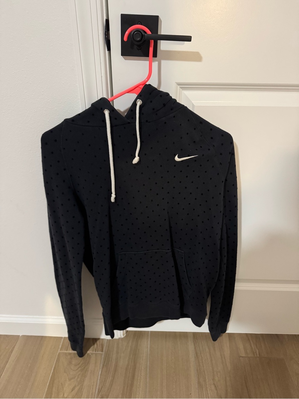 Nike Women’s Black Dotted Hooded Sweatshirt with White Swoosh